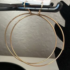 ON SALE TODAY $8.   24 centimeters. 10K Gold filled Large hoops. New with tags.